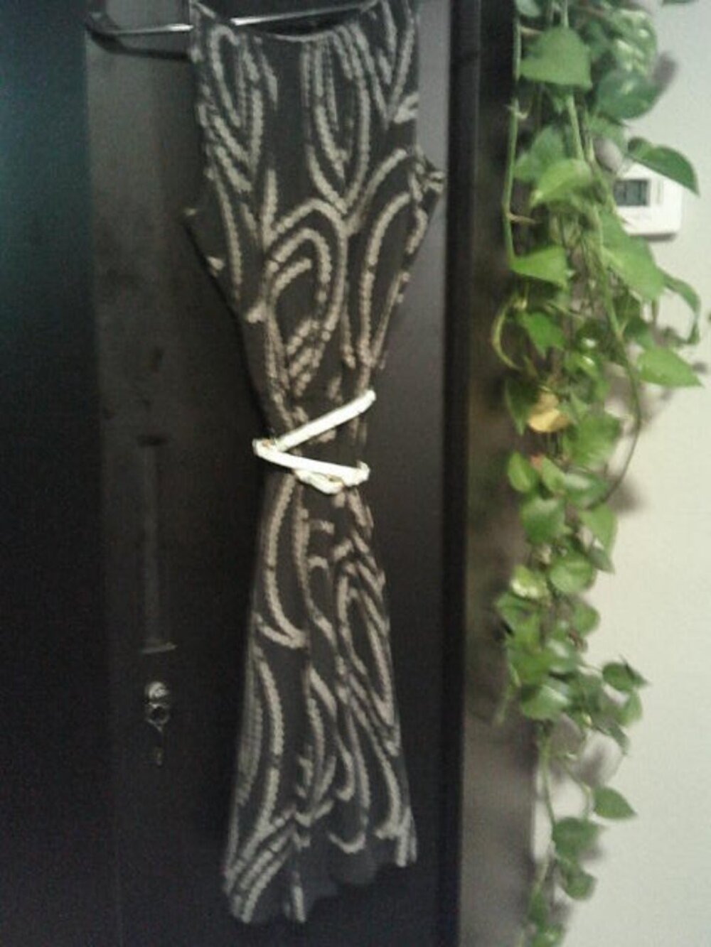 Black silk dress with chain link design